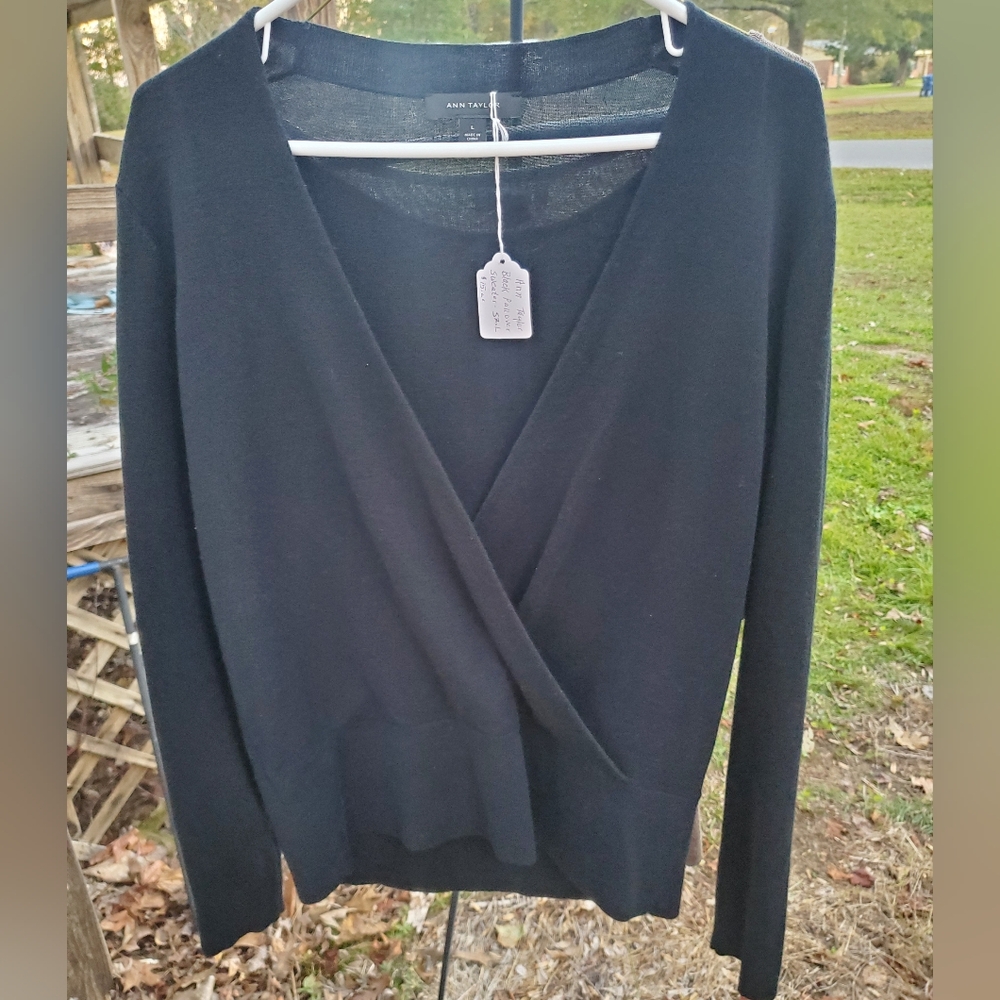 Ann Taylor black pullover sweater, size large.